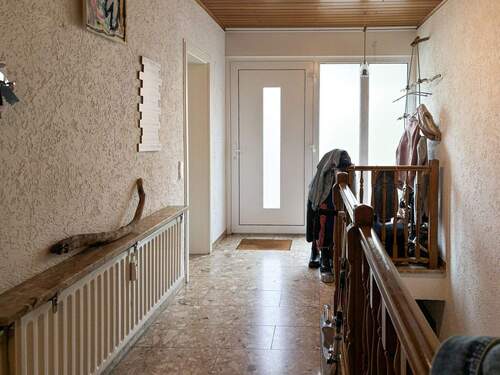 Eingangsbereich EG - Einfamilienhaus mit 200,00 m² in Windeck zum Kaufen