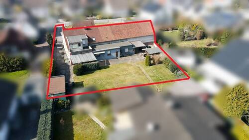 Seitenansicht mit Zufahrt - Mehrfamilienhaus, Wohnhaus mit 160,00 m² in Detmold zum Kaufen