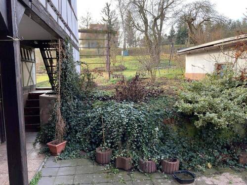 Blick in den Garten - Einfamilienhaus mit 150,00 m² in Pößneck zum Kaufen