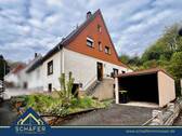 1 - Doppelhaushälfte mit Garten und Garage - Ihr Sanierungsprojekt mit Potenzial in Großrosseln