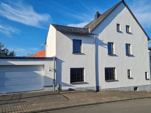 Seitenansicht - Einfamilienhaus mit 200,00 m&sup2; in Rüscheid zum Kaufen