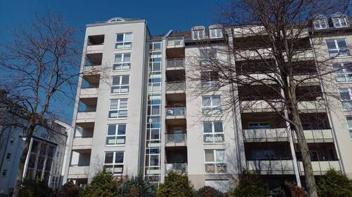 Hausansicht - vermietete 1-Raum Wohnung mit Tiefgaragenstellplatz in Traumlage zu verkaufen