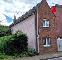 Bereit für neue Ideen! Kleines Einfamilienhaus mit 2 Garagen in Linden-Neusen - Würselen Broichweiden