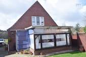 Bild 1 - gepflegtes Einfamilienhaus mit Nebengebäude in Aurich Popens
