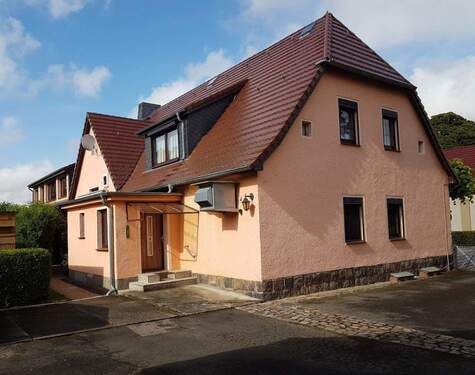 Wohn- und Geschäftshaus 5 - 