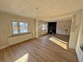 Wohn- und Esszimmer - 4 Zimmer Einfamilienhaus zum Kaufen in Aurich / Walle