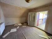 Zimmer im Dachgeschoss - 