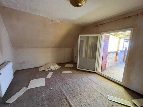 Zimmer im Dachgeschoss - 