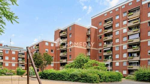 Außenansicht 1 - Gemütliche 2-Zimmer-Wohnung mit großem Balkon und Tiefgarage in ruhiger Lage
