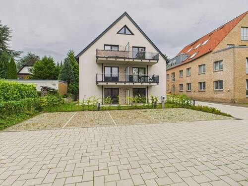 Rückseite des Hauses - Etagenwohnung mit 60,20 m&sup2; in Lübeck zum Kaufen