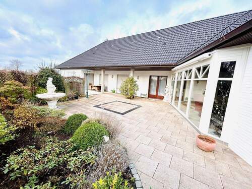 Bild 1 - Stilvoller Winkelbungalow - auf sonnigem Grundstück - ohne Makler