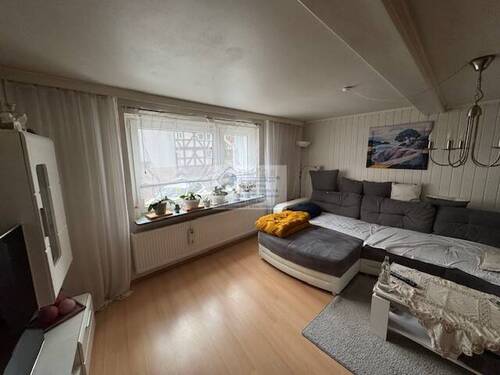 Wohnzimmer - Einfamilienhaus in Homberg Efze zum Kaufen