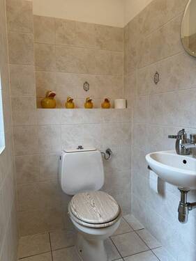 Gäste WC.JPG - Doppelhaushälfte mit 107,00 m&sup2; in Neu Wulmstorf zur Miete