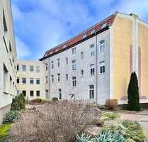 MEHRFAMILIENHAUS UND GEWERBEEINHEITEN IN OSCHERSLEBEN (BODE)