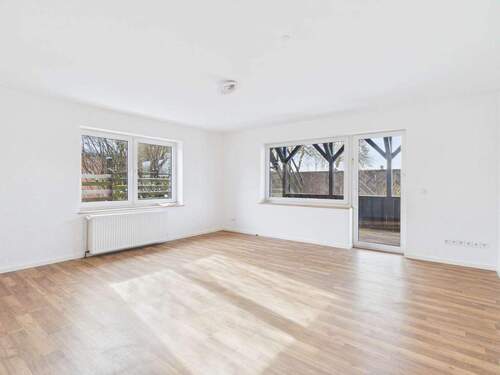 Wohnzimmer - 5 Zimmer Einfamilienhaus zum Kaufen in Oetzen