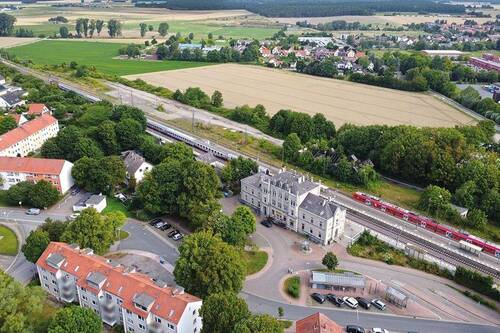 Luftbild - Straßenseite - Mehrfamilienhaus, Wohnhaus zum Kaufen in Königslutter