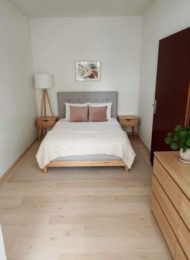 Schlafzimmer- (KI generiert) - Gemütliche Eigentumswohnung zur Eigennutzung oder Vermietung.