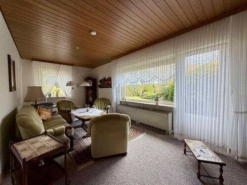 Wohnzimmer - Bauernhaus, Landhaus mit 130,00 m² in Großefehn zum Kaufen