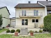 Gartenansicht - Familienfreundliches Zuhause mit Garten, Doppelgarage und Hobbyraum