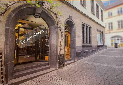 Bild 1 - Wohnen oder Gewerbe - 2-Zimmer-Wohnung mit Terrasse im denkmalgeschützten Stadthaus