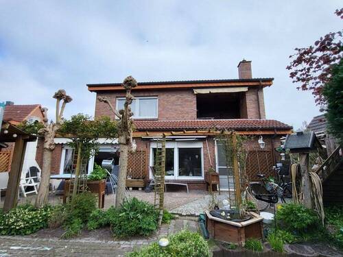 Rückansicht - Mehrfamilienhaus, Wohnhaus mit 205,60 m&sup2; in Papenburg zum Kaufen