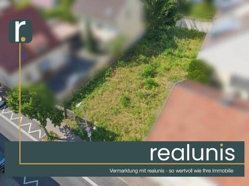Luftbild - Startklar zum Bauen: Grundstück mit Planung in beliebter Wohnlage - nur bei realunis