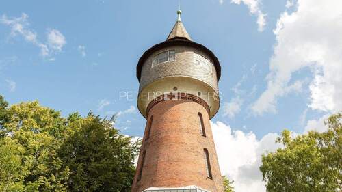 Außenansicht - + Wohnen und Arbeiten im Wasserturm +