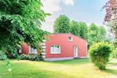 Gartenansicht - Im Jahr 1967 gebaut, heute optimiert - Ein Zuhause im Bungalow Stil mit großem Grundstück mitten in Sörup