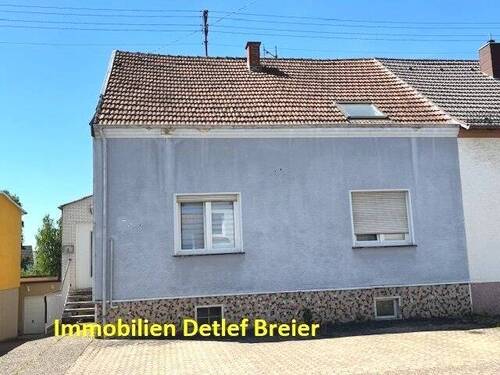 Straßenansicht 2 - EINFAMILIENHAUS MIT 2 WOHNEINHEITEN UND GARTEN IN 66773 SCHWALBACH-HÜLZWEILER