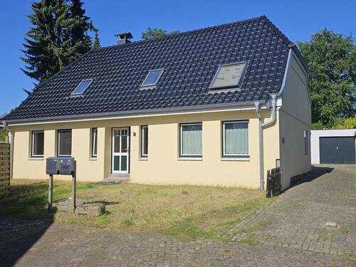 Immobilie mit zwei Wohneinheiten - Wohnen und vermieten: Energetisch saniertes Haus mit 2 separaten Wohneinheiten