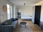 Wohnbereich - Moderne, möblierte 1-Zimmer-Wohnung in U-Bahn-Nähe!