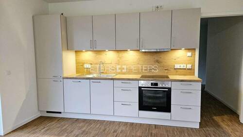 Musterküche Einbauküche - Etagenwohnung mit 90,00 m&sup2; in Pinneberg zur Miete