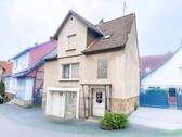 1 Titelbild - Vermietetes Einfamilienhaus mit Nebengebäude in ruhiger Lage in Bodenfelde
