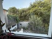 Blick (OG) auf Terrasse im EG - 
