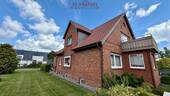Hausansicht - 8 Zimmer Mehrfamilienhaus, Wohnhaus in Wunstorf
