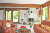 Wohnbereich mit Zugang zur Gartenterrasse - 
