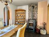Essbereich mit Kaminofen - 5 Zimmer Doppelhaushälfte in Wachenroth