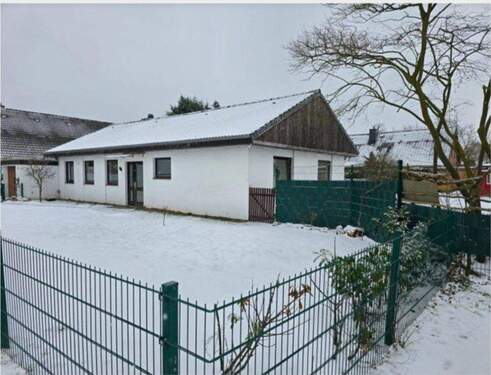 Vorder-Seitenansicht - 5 Zimmer Mehrfamilienhaus, Wohnhaus zum Kaufen in Tespe