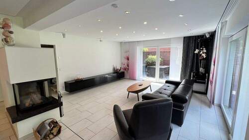 Wohnzimmer mit Kaminofen - 