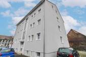 Seitenansicht - 2 Zimmer Mehrfamilienhaus, Wohnhaus zum Kaufen in Karben