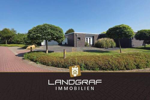 Ansicht - Exklusiver Lebensraum! Design trifft Großartigkeit – moderner Bungalow mit separaten Rückzugsorten für mehrere Generationen.