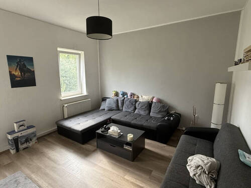 Wohnzimmer - 2 Zimmer Etagenwohnung in Sande