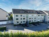 Außenansicht - Sonnige Hochparterre-Wohnung mit privater Terrasse und grünem Flair
