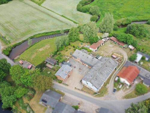 Luftaufnahme - 1 Zimmer Mehrfamilienhaus, Wohnhaus zum Kaufen in Silberstedt