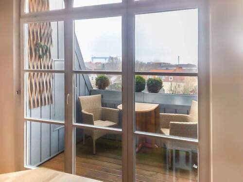 Loggia mit Ausblick über die Dächer Kiels - 