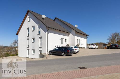 Seitenansicht - 1 Zimmer Mehrfamilienhaus, Wohnhaus zum Kaufen in Osterburken