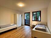 Wohnzimmer mit angrenzendem Balkon - Kernsaniertes Schmuckstück mit modernem Design!