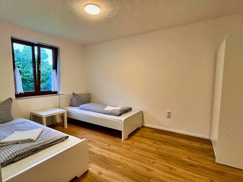 Schlafzimmer - 2 Zimmer Etagenwohnung zum Kaufen in Miesbach