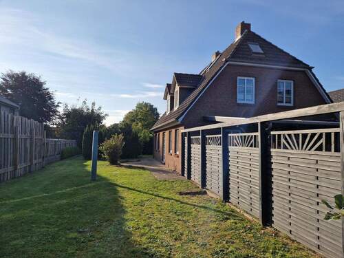 seitlicher Garten - Einfamilienhaus mit 129,00 m² in Ahrenshöft zum Kaufen