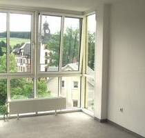 Vermietete 4-Zimmer-Eigentumswohnung mit TG-Stellplatz - Thalheim/Erzgebirge